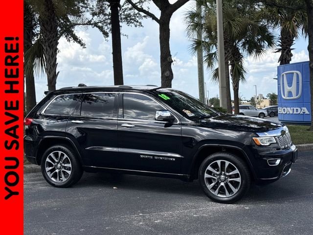 Used 2019 Molten Lava Pearl Honda Touring image 1