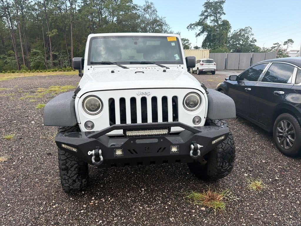 Used 2017 White Jeep Unlimited Sport image 2
