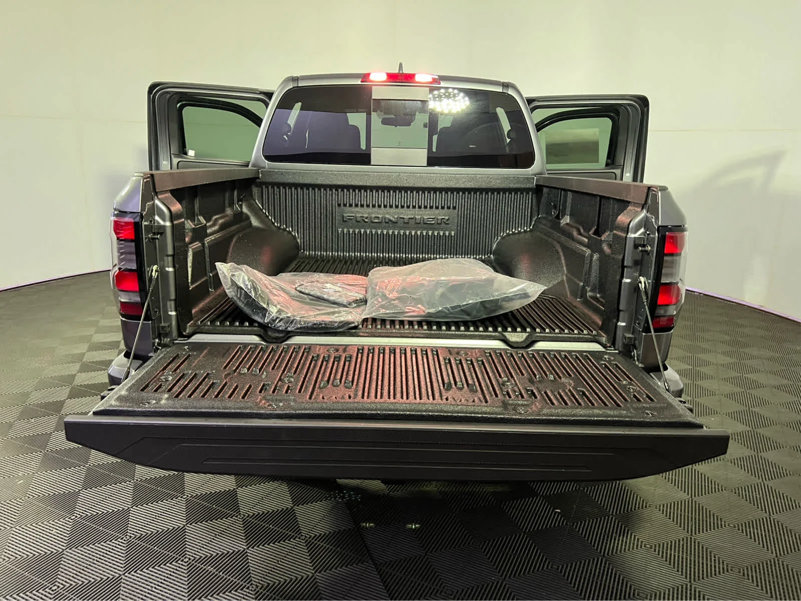 New 2026 Gun Metallic Nissan Crew Cab SV image 17