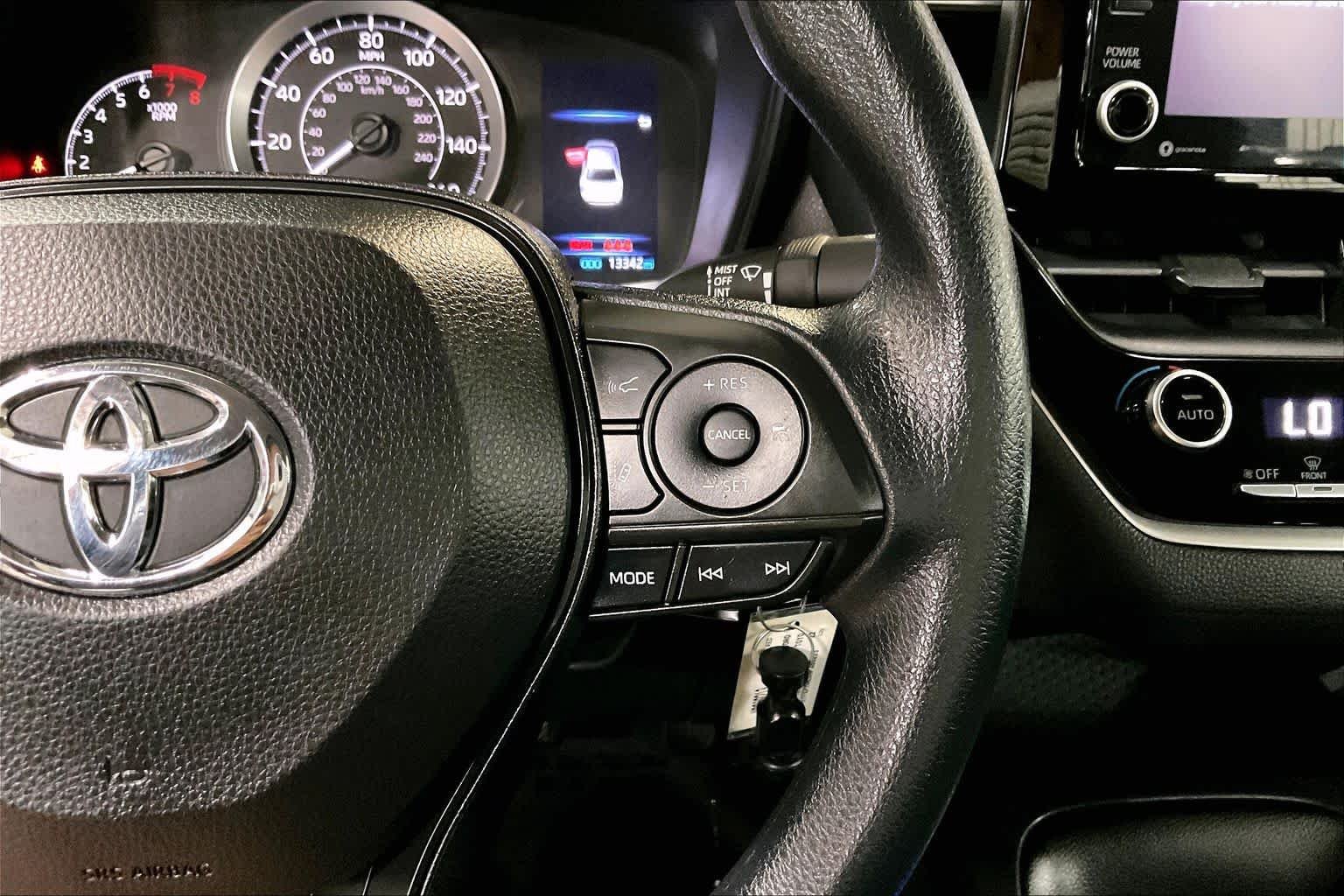 Used 2022 Ruby Flare Pearl Toyota LE image 24