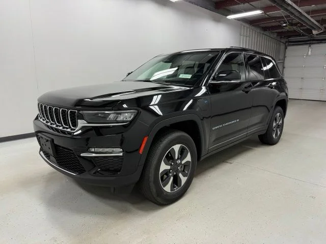 Certified Used 2024 Black Jeep 4xe image 1