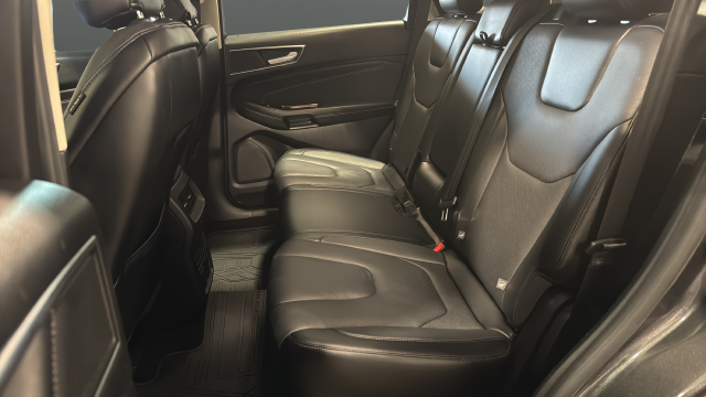 Used 2015 Magnetic Metallic Ford Titanium image 24
