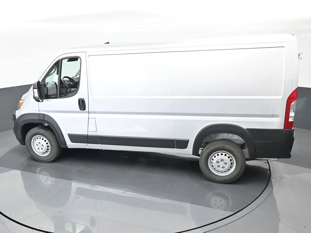 Used 2025 Bright Silver Clearcoat Metallic Ram Low Roof image 40