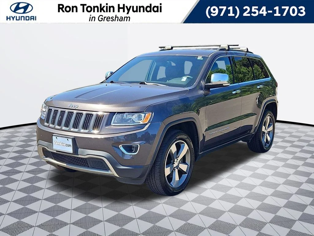 Used 2015 Granite Crystal Metallic Clearcoat Jeep Limited image 1