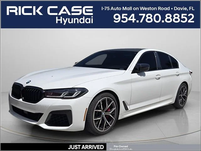 Used 2022 White BMW M550i xDrive image 1