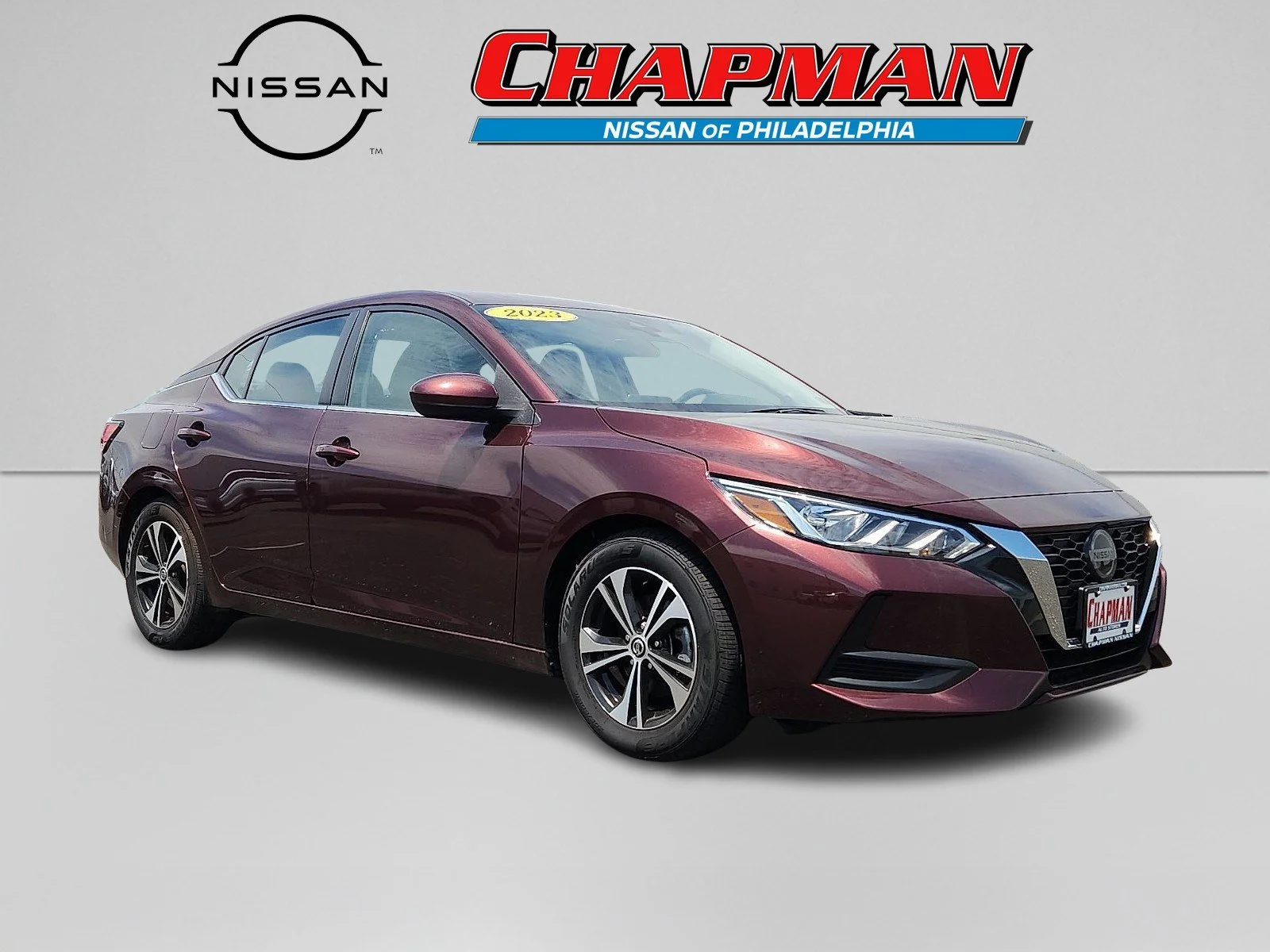 Used 2023 Rosewood Metallic Nissan SV image 1