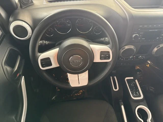 Used 2014 Silver Jeep Unlimited Sport image 25