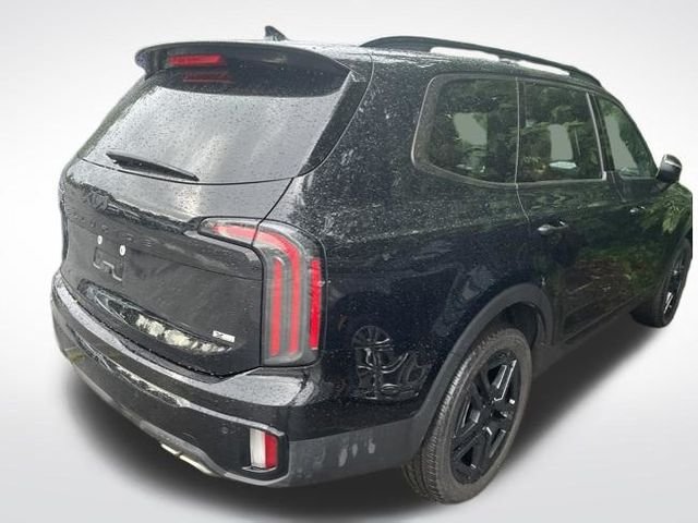 Used 2025 Ebony Black Kia EX X-Line image 5