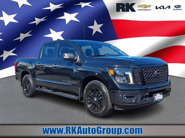 Used 2019 Black Nissan SV image 1