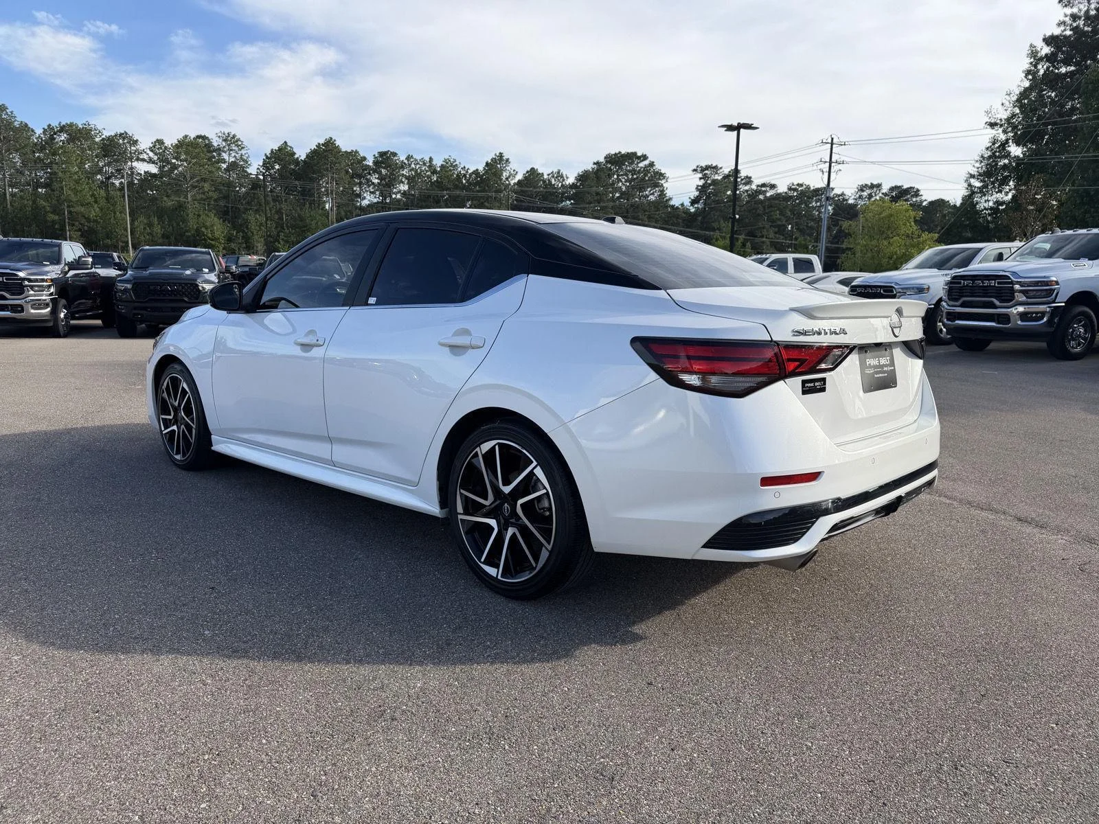 Used 2025 Aspen White/Super Black Nissan SR image 4