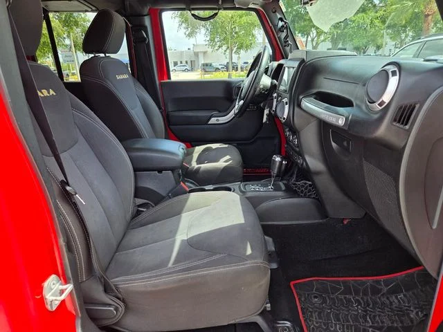 Used 2015 Red Jeep Unlimited Sahara image 18