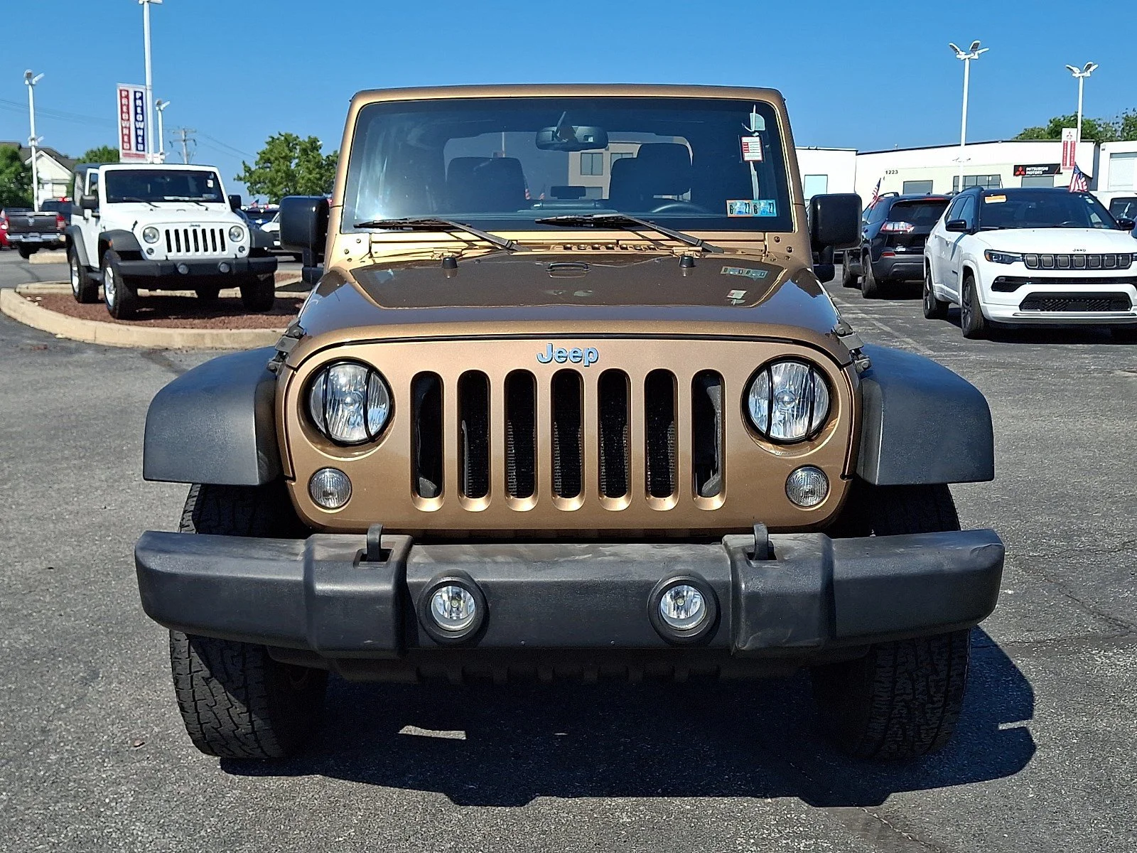 Used 2015 Copper Brown Pearlcoat Jeep Sport image 2
