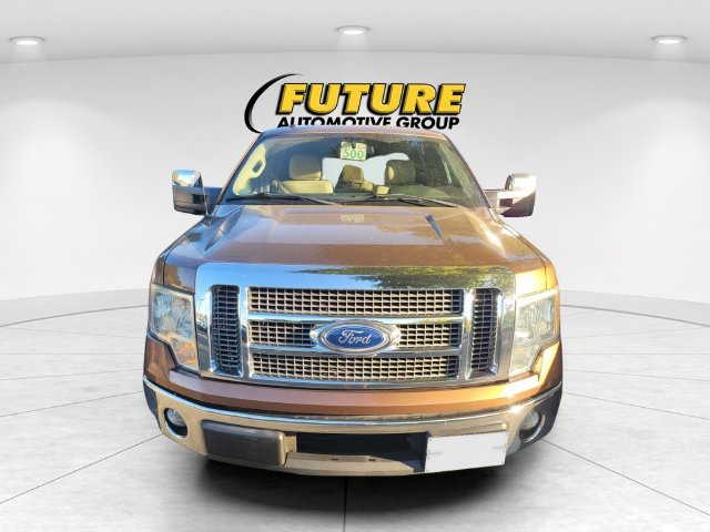 Used 2011 Gold Ford Lariat image 2