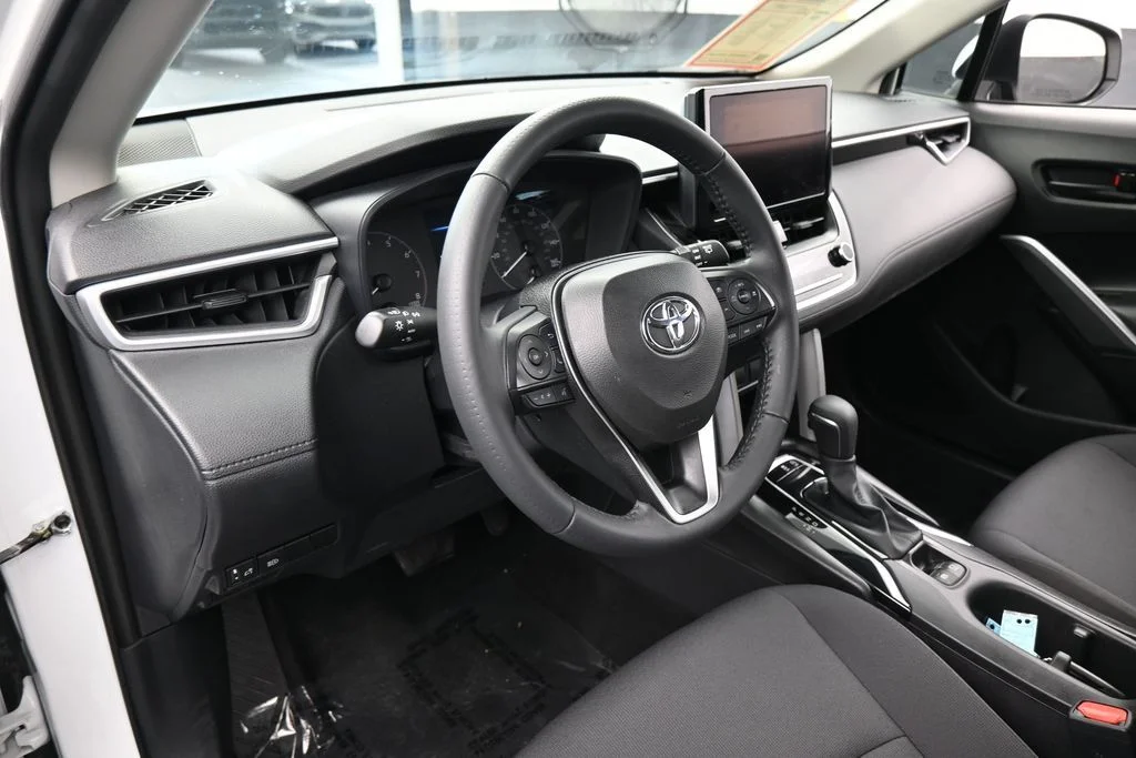 Used 2024 Pearl Toyota LE image 9