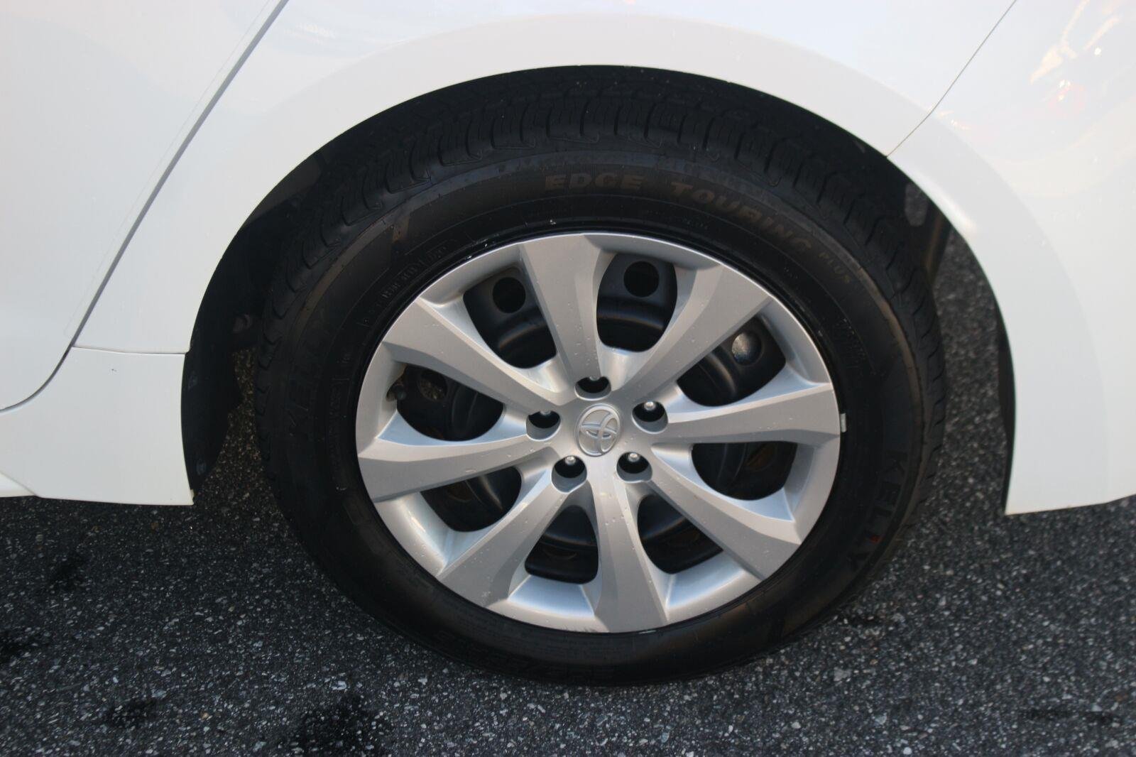 Used 2024 White Toyota LE image 30