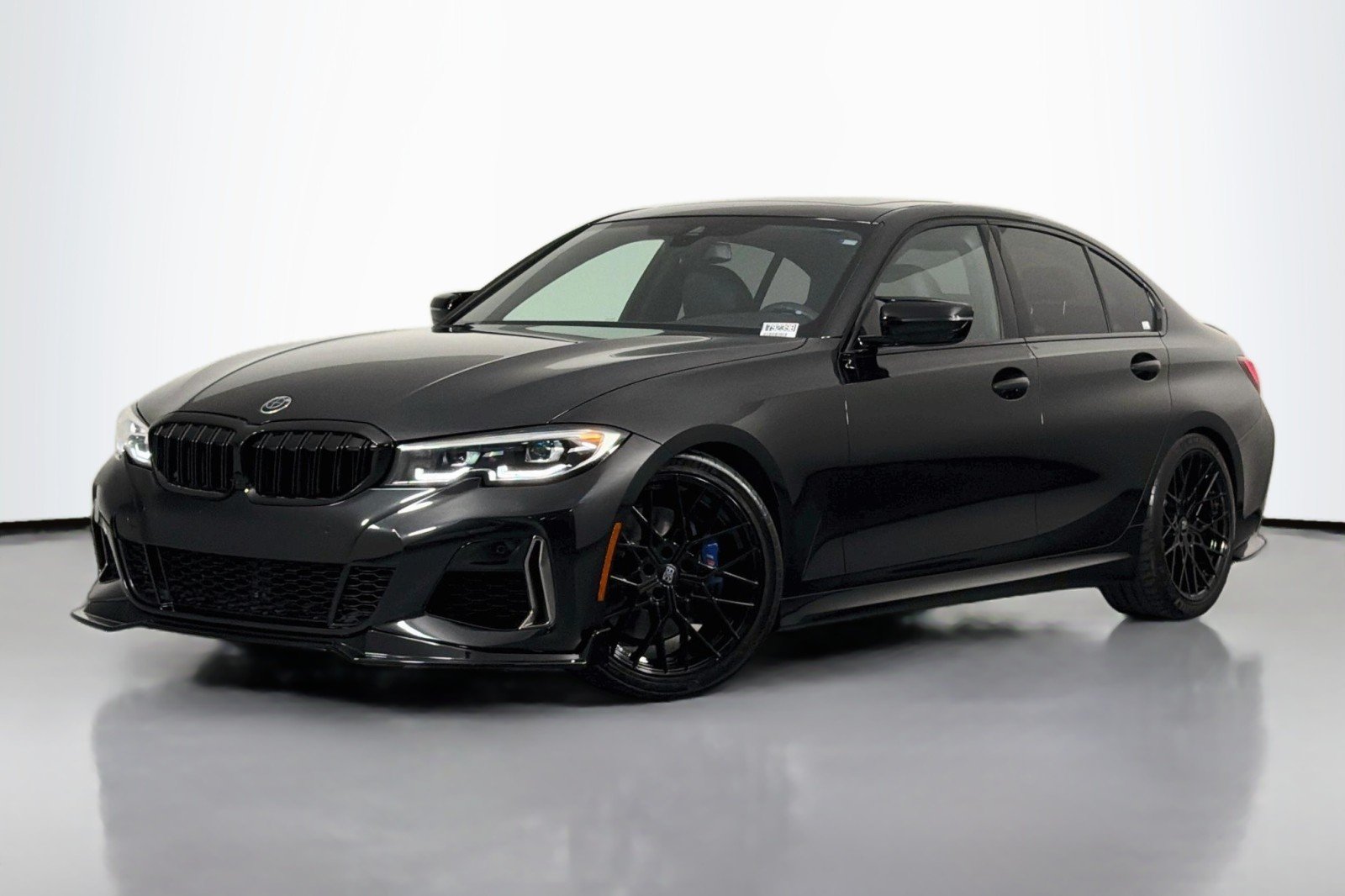 Used 2020 Black Sapphire Metallic BMW M340i image 1