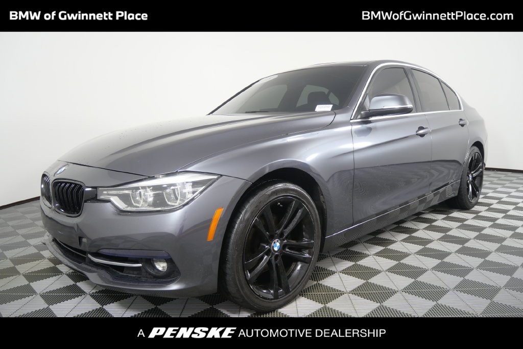 Used 2018 Mineral Gray Metallic BMW 330i image 1