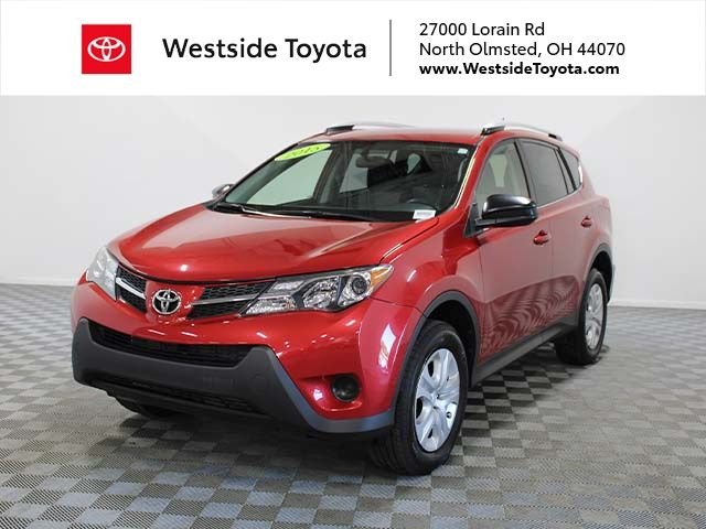 Used 2015 Barcelona Red Metallic Toyota LE image 1