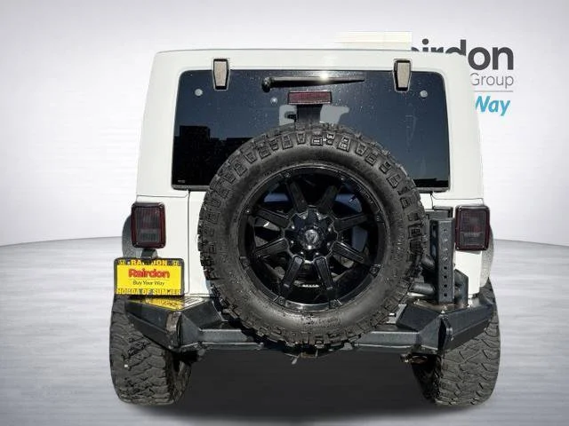 Used 2014 Bright White Clearcoat Jeep Unlimited Sahara image 6