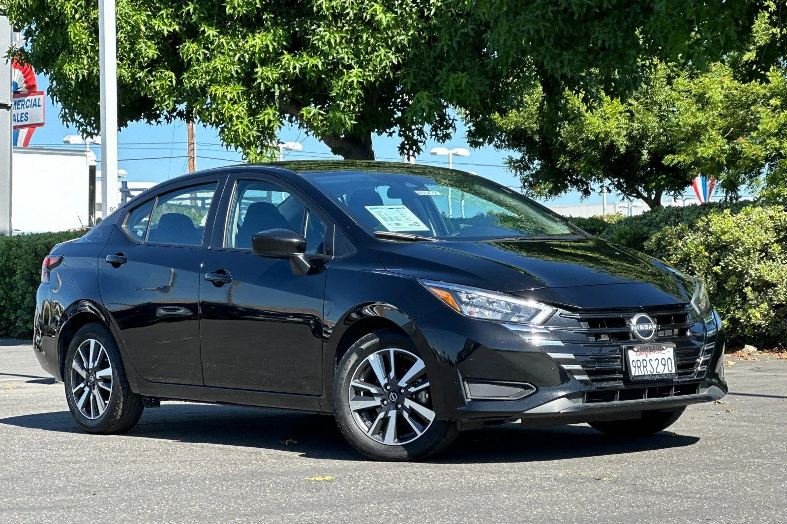 Used 2025 Super Black Nissan SV image 1