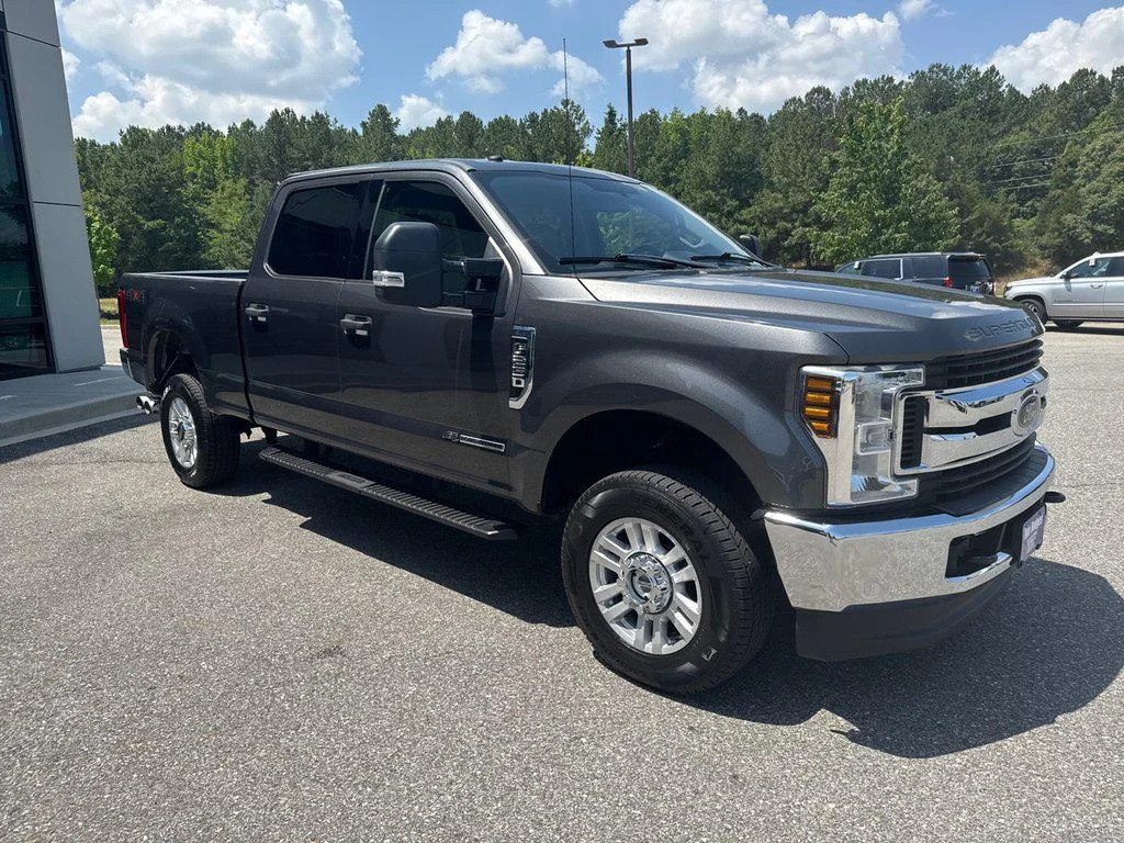 Used 2019 Magnetic Metallic Ford XLT 4WD Crew Cab 6.75 Box image 3