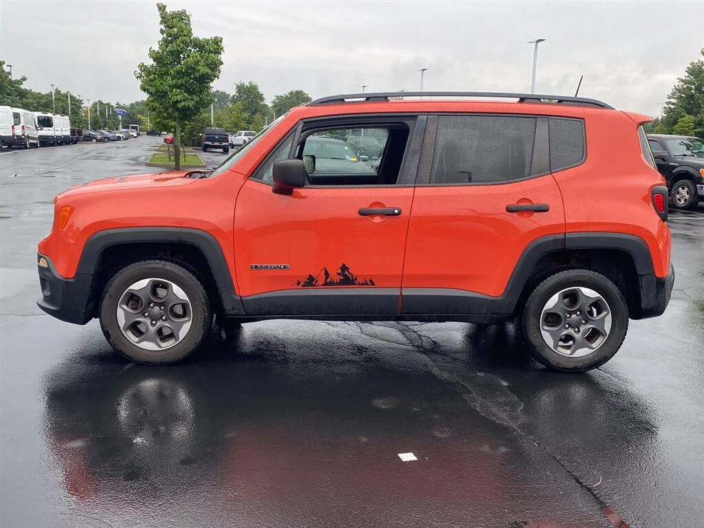 Used 2018 Omaha Orange Jeep Sport image 7
