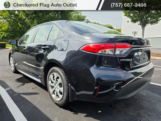 Used 2023 Midnight Black Metallic Toyota LE image 4