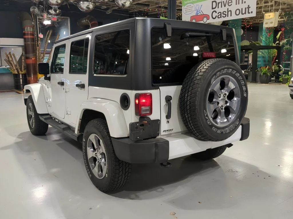 Used 2016 White Jeep Unlimited Sahara image 11