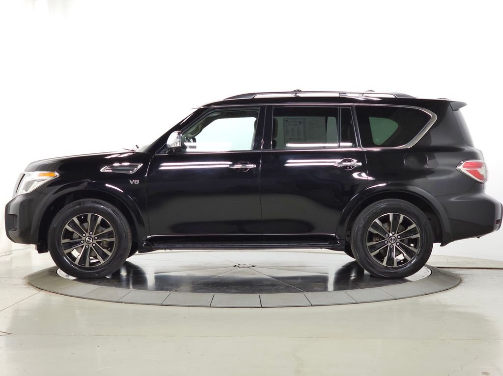 Used 2020 Super Black Nissan Platinum image 4