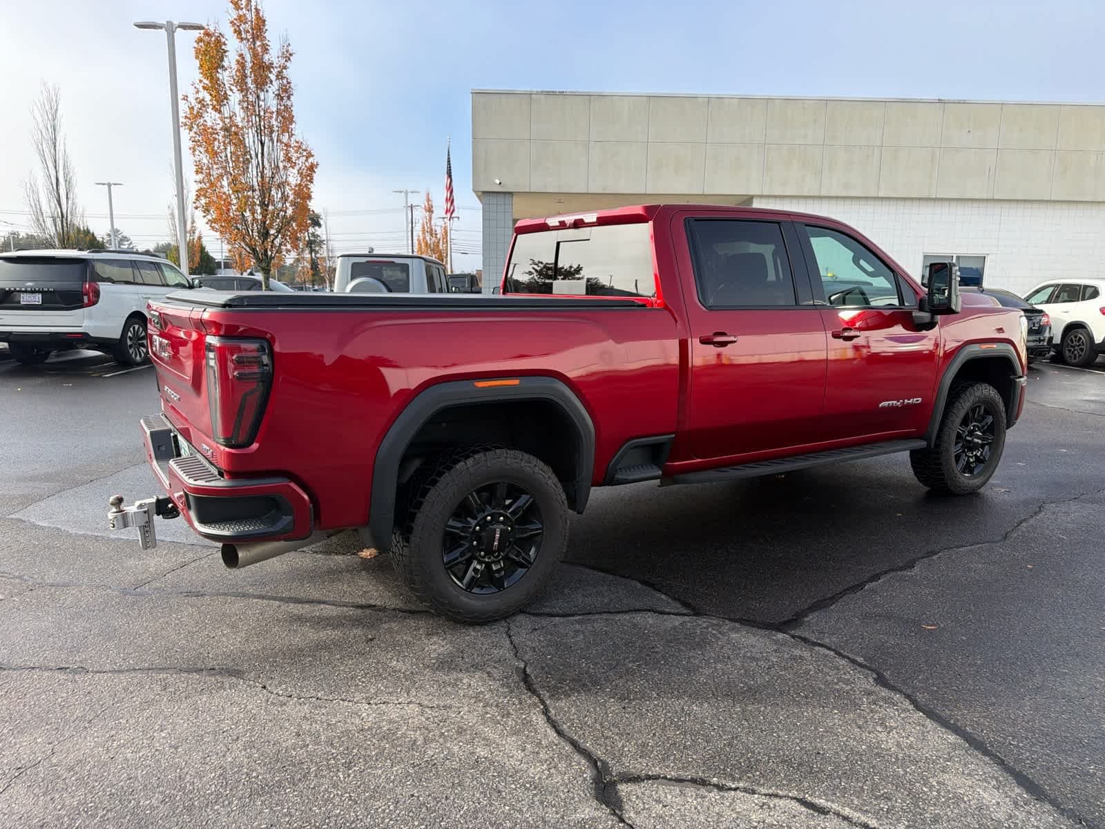 Used 2025 Volcanic Red Tintcoat GMC AT4 image 8
