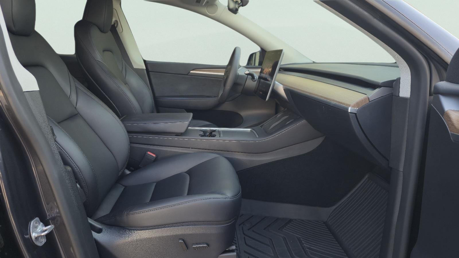 Used 2024 Solid Black Tesla Long Range image 19
