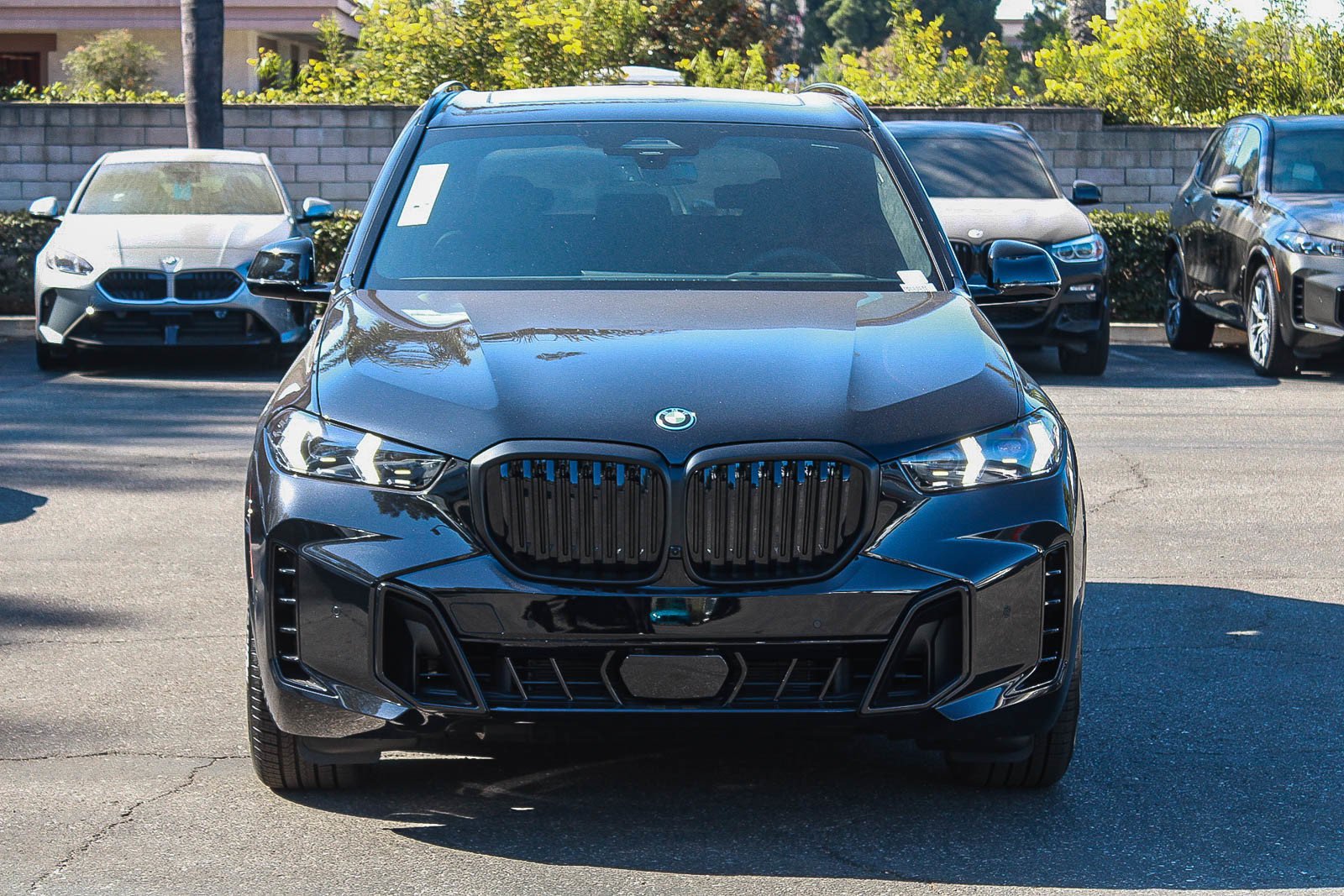 New 2026 Black Sapphire Metallic BMW xDrive50e image 2