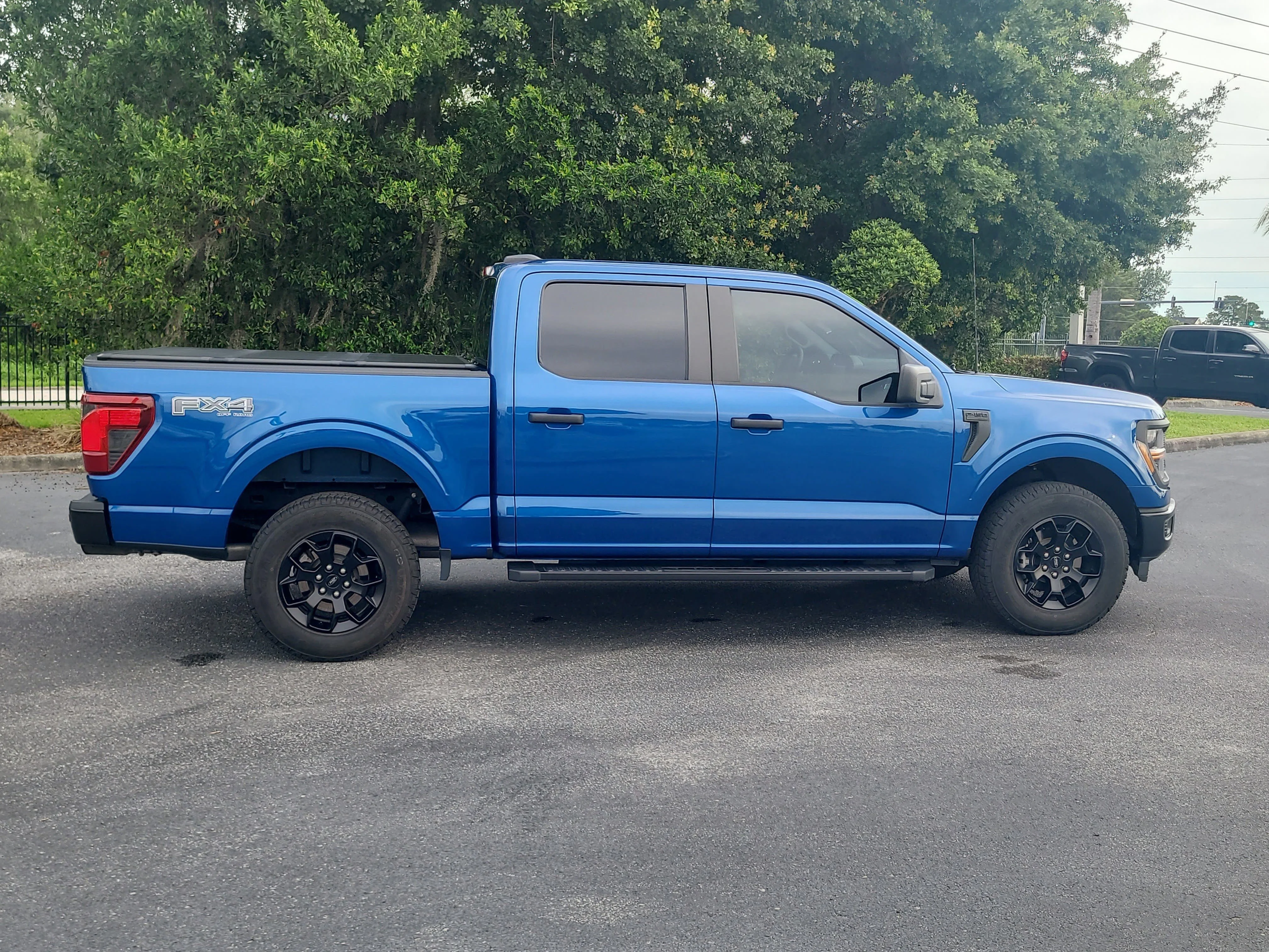 Used 2024 Blue Metallic Ford STX image 7