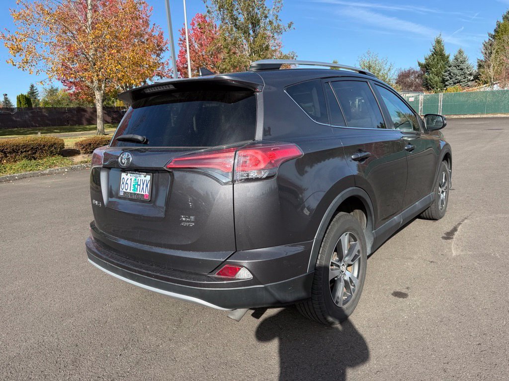 Used 2016 Magnetic Gray Metallic Toyota XLE image 7