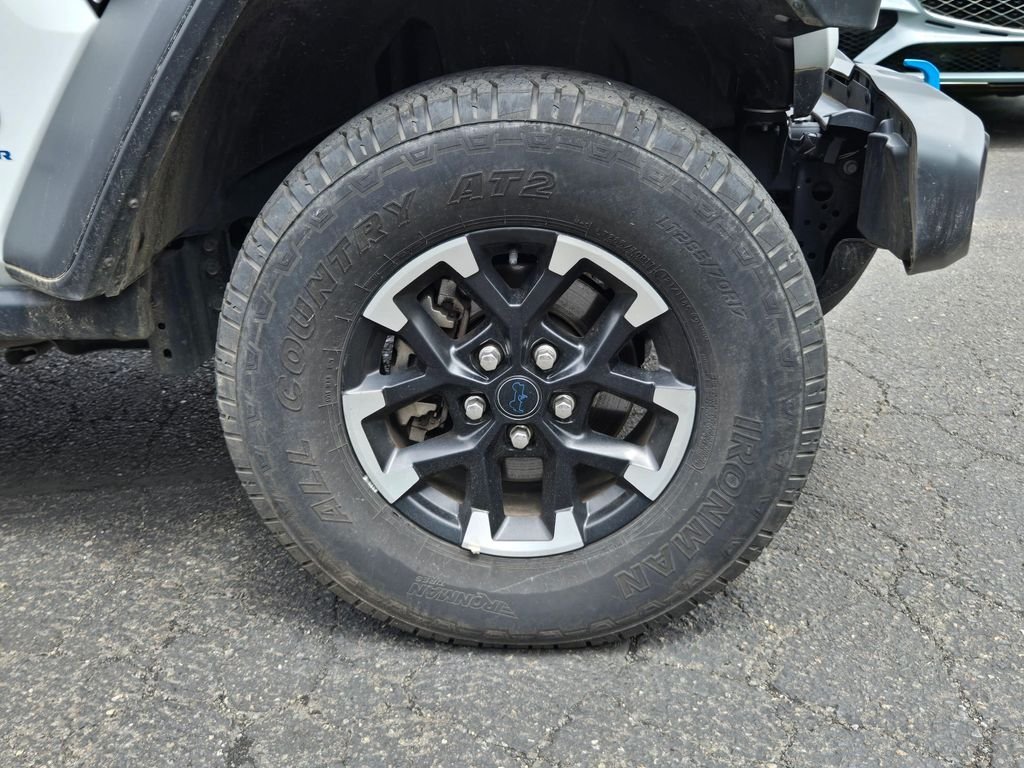Used 2024 Bright White Clearcoat Jeep Rubicon 4xe image 9
