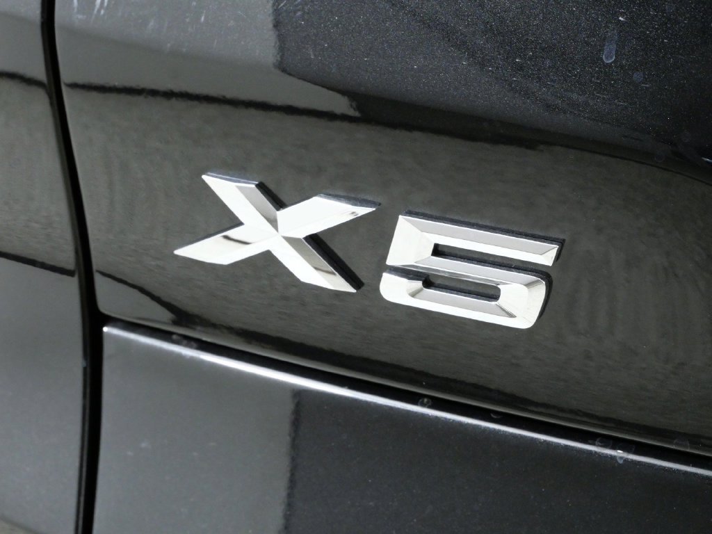 New 2026 Black Sapphire Metallic BMW xDrive50e image 13