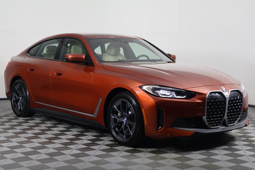 Certified Used 2023 Sunset Orange Metallic BMW eDrive35 image 3