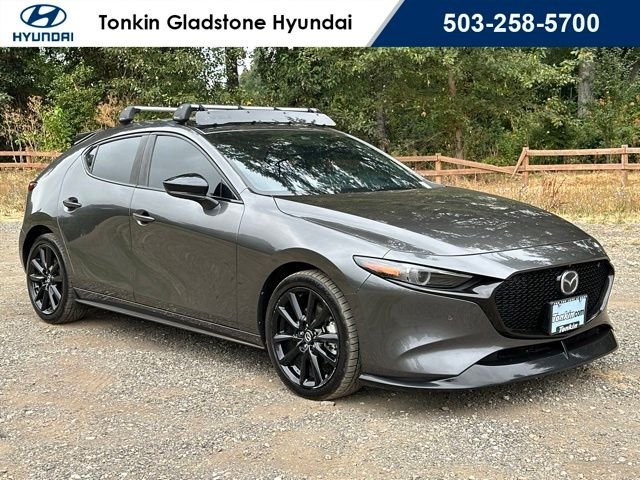 Used 2021 Machine Gray Metallic Mazda Premium Plus image 1