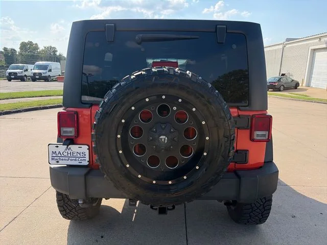 Used 2015 Orange Jeep Unlimited Sport image 27