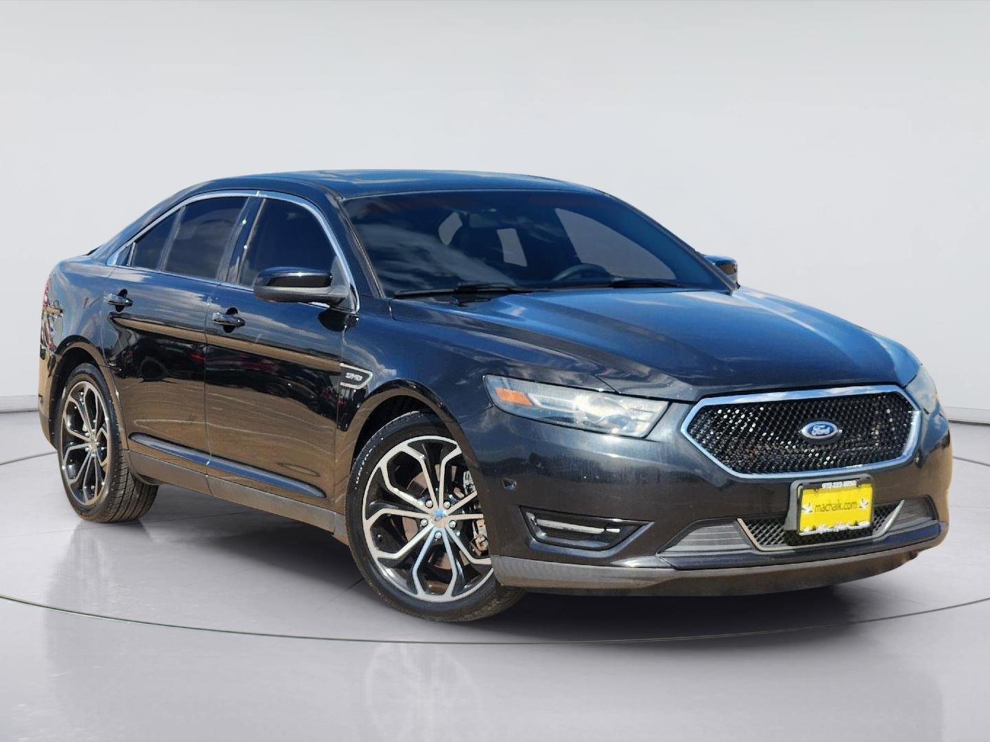 Used 2013 Tuxedo Black Metallic Ford SHO image 1