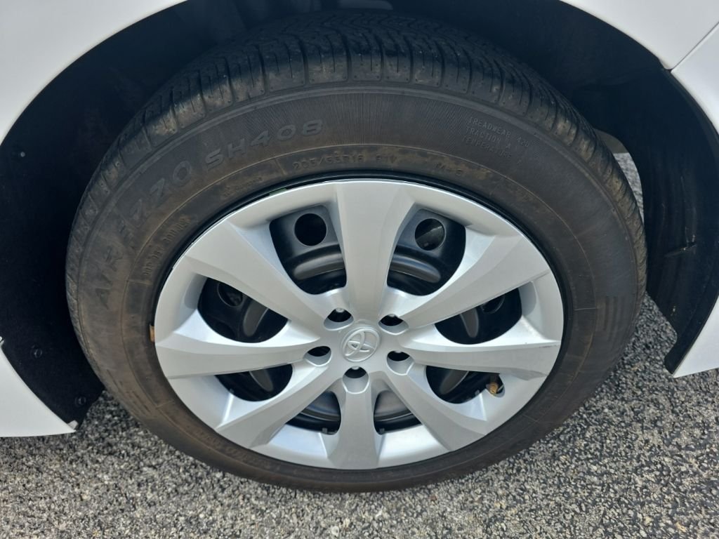 Used 2024 White Toyota LE image 7