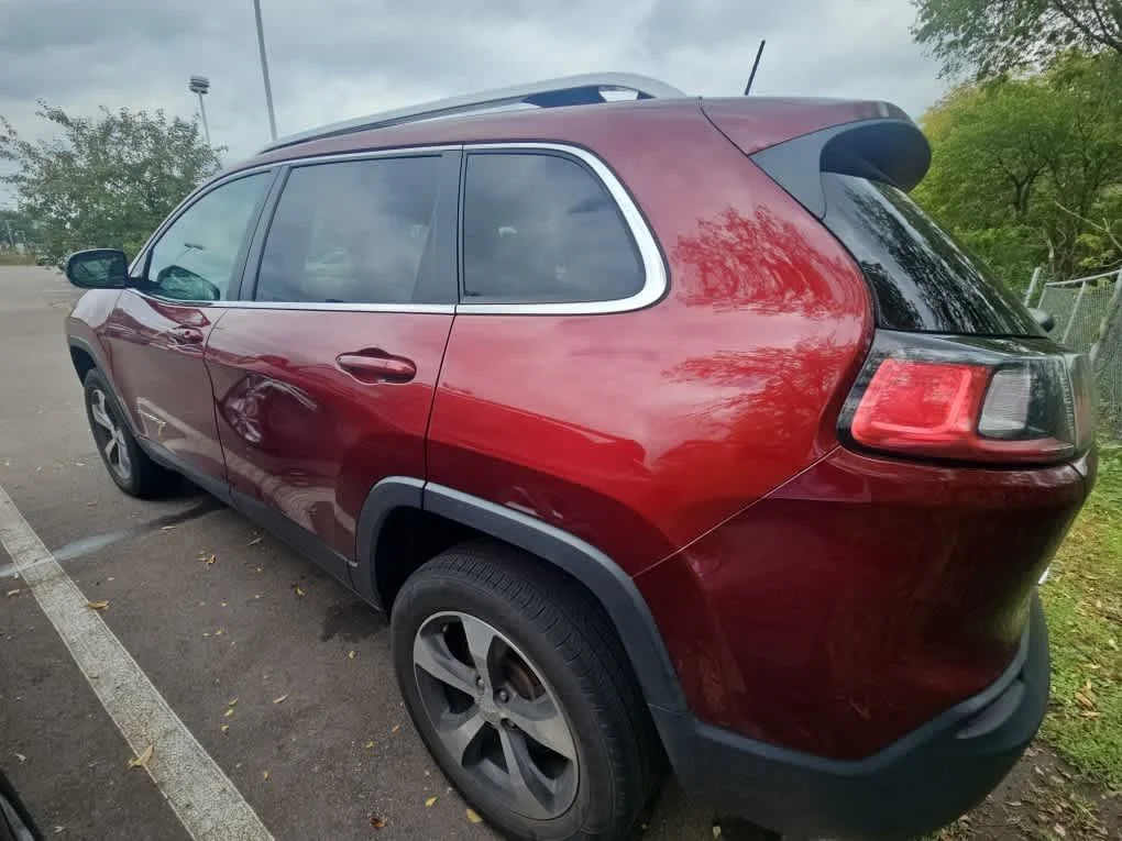 Used 2019 Velvet Red Pearlcoat Jeep Limited image 6