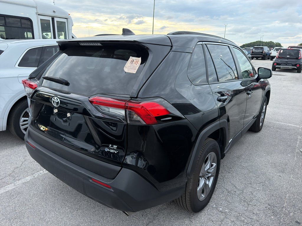 Used 2025 Midnight Black Metallic Toyota Hybrid LE image 4