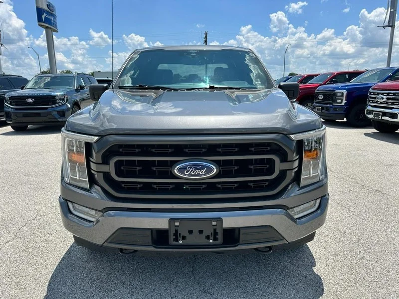 Used 2021 Carbonized Gray Metallic Ford XLT 4WD SuperCrew 5.5