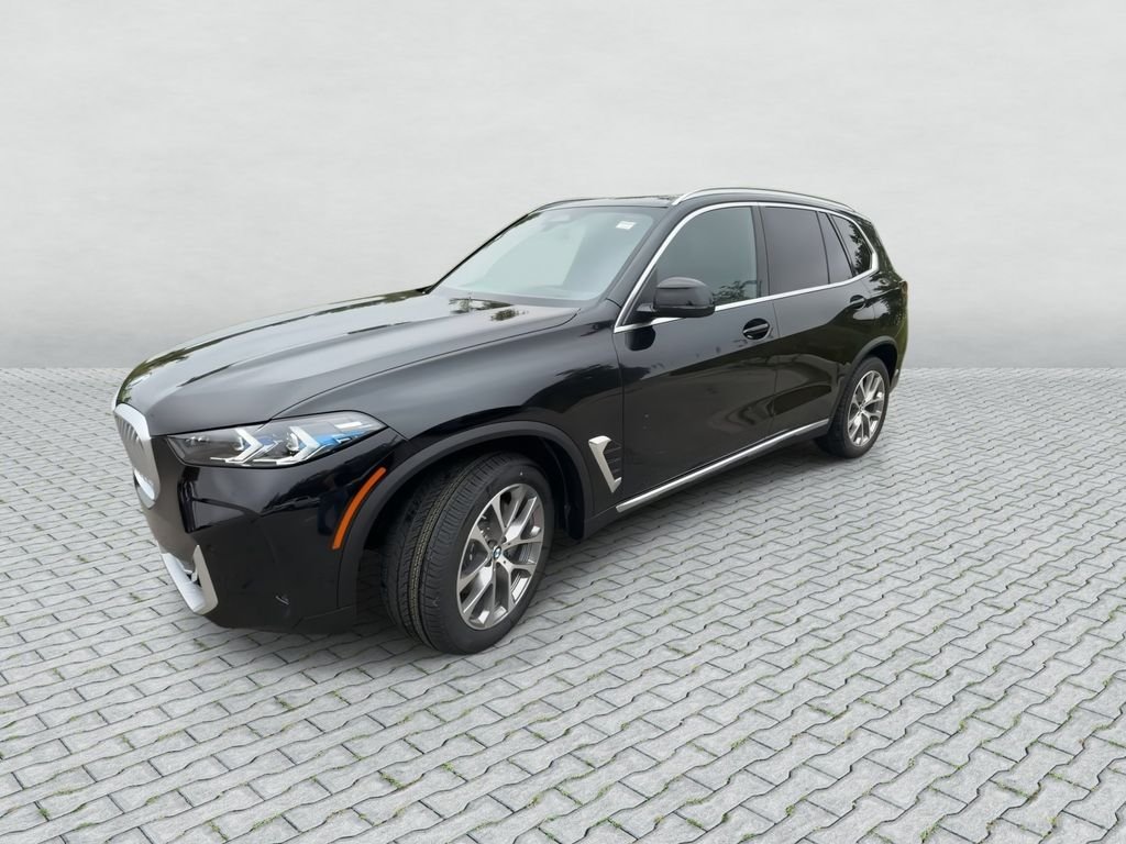 New 2026 Black Sapphire Metallic BMW xDrive40i image 4