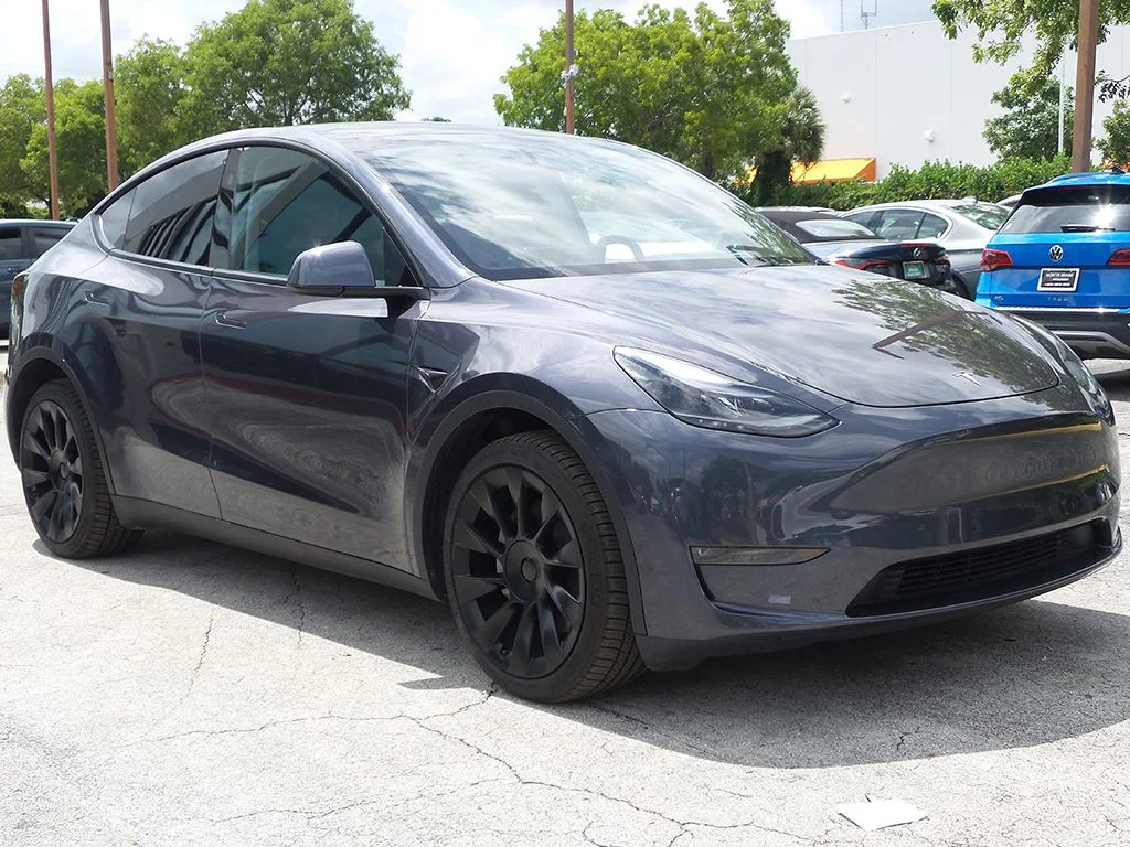 Used 2023 Tesla Model Y Long Range with VIN 7SAYGDEE1PA167148 for sale in Miami, FL