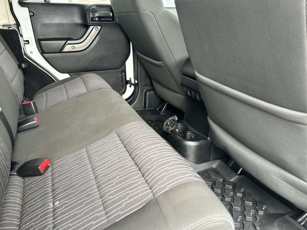 Used 2012 Bright White Jeep Unlimited Sport image 17