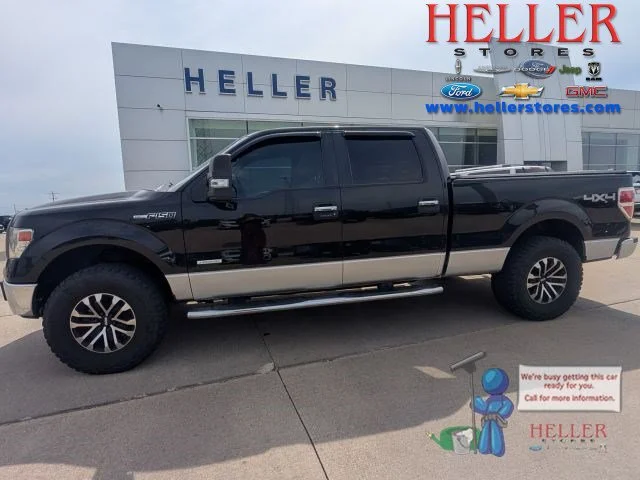 Used 2014 Tuxedo Black Metallic Ford XLT image 1