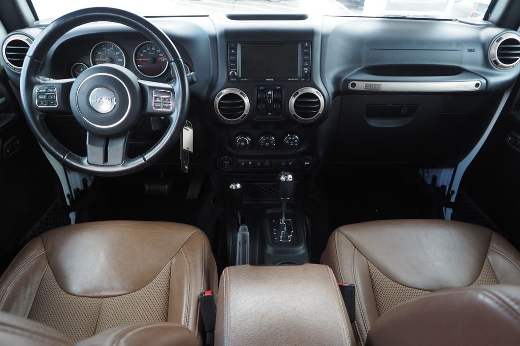 Used 2017 White Jeep Unlimited Sahara image 16