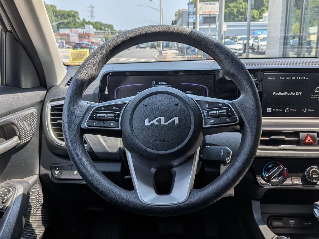 Used 2025 Blue Kia LX image 13